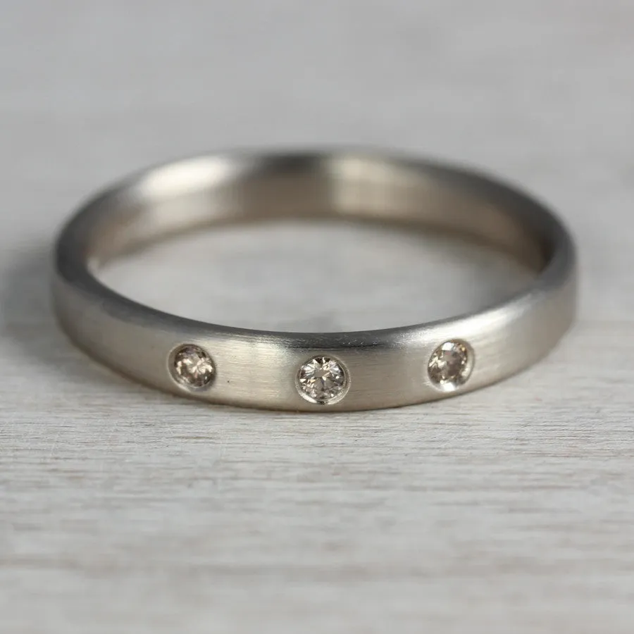 Edgeless Band with Three Flush Set Champagne Diamonds