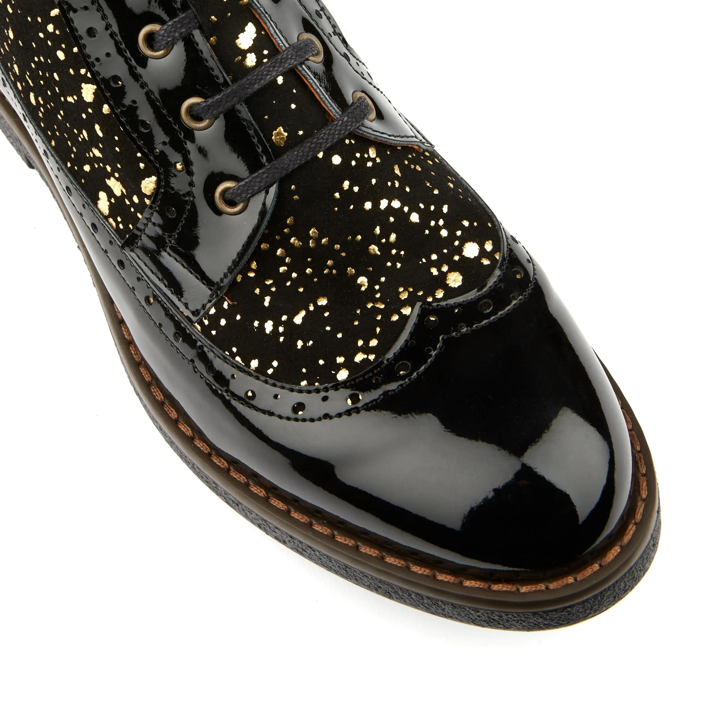 HATTER GOLD DROPS - Women's ankle boot in golden paint drops on black leather